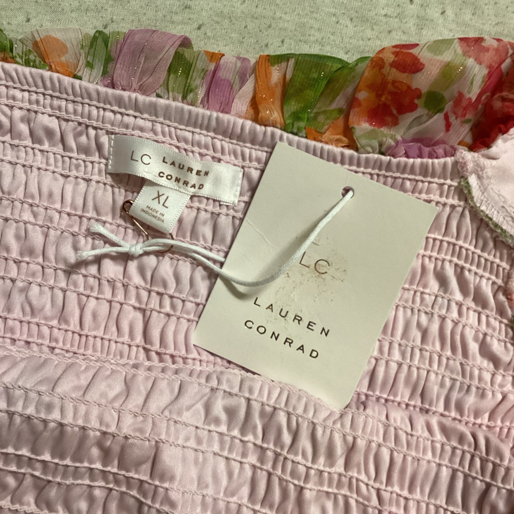Lost in the 🔥 
NWT LC Floral Smocked Ruffle Tank - Picture 7 of 9
